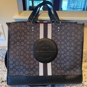 Large coach bag with long strap